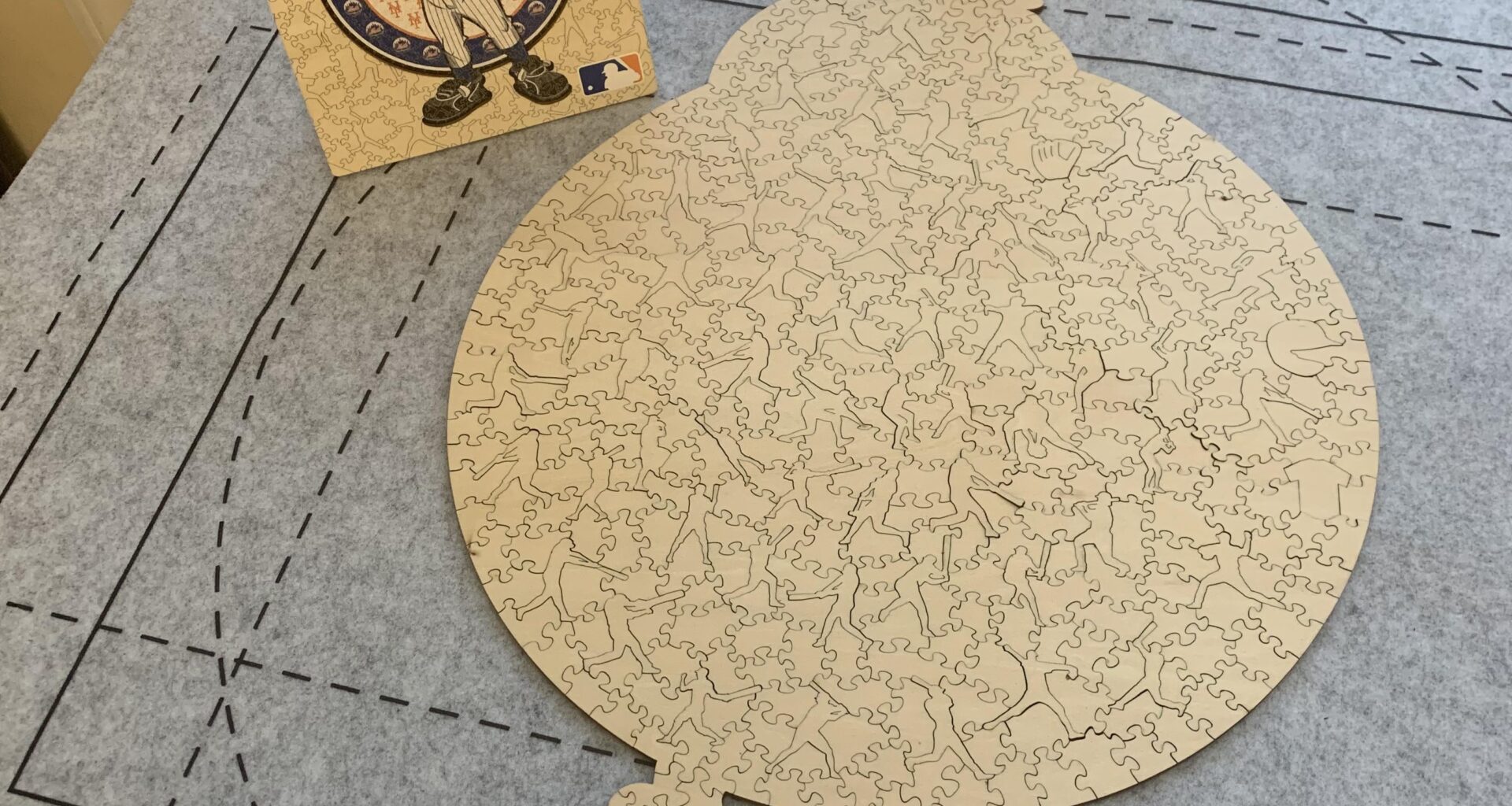 I completed a Mr. Met puzzle and when I flipped it over to glue it, I realized that it looked like Grimace!