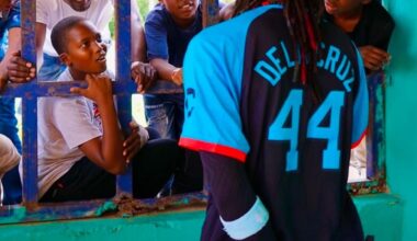 Elly de la Cruz with kiddos in exhibition game