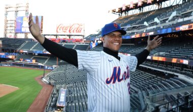 Juan Soto poses in front of Citi Field, his new home for the next 15 years