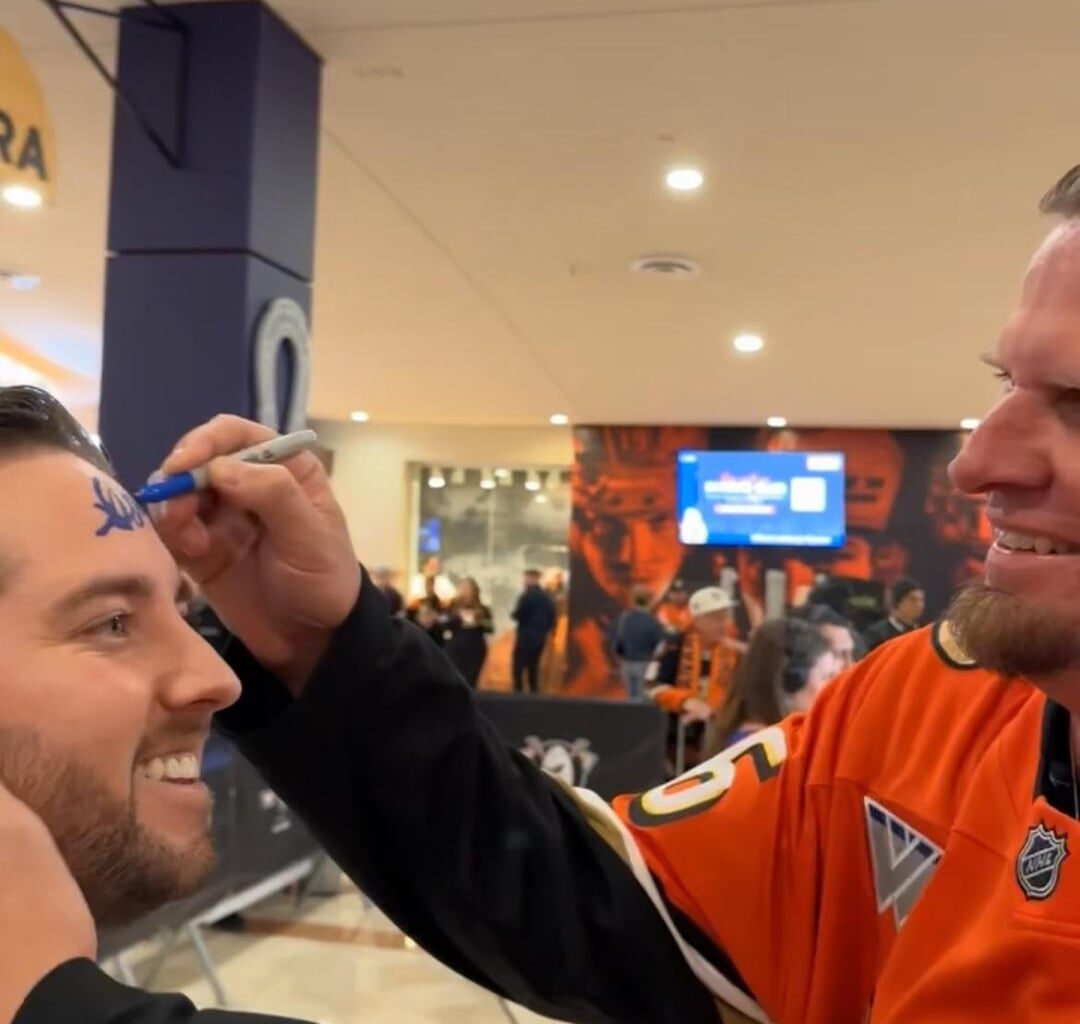 Weaver signing my nephews forehead at tonight’s Ducks game. Legend