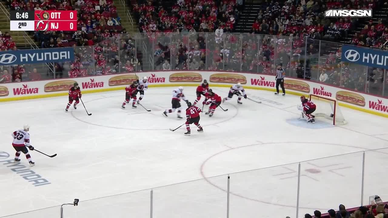 Zack Ostapchuk scores a goal against the New Jersey Devils