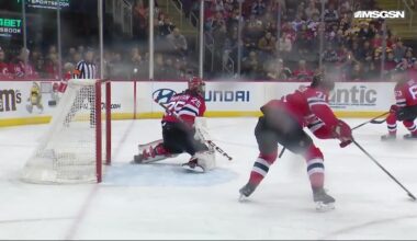 Morgan Geekie scores a goal against the New Jersey Devils