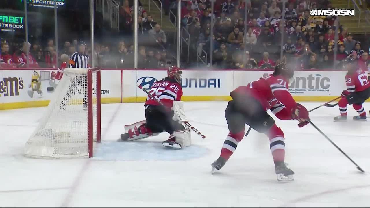 Morgan Geekie scores a goal against the New Jersey Devils