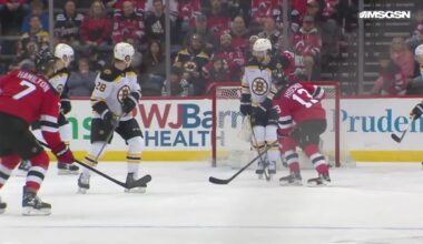 Nico Hischier scores a goal against the Boston Bruins