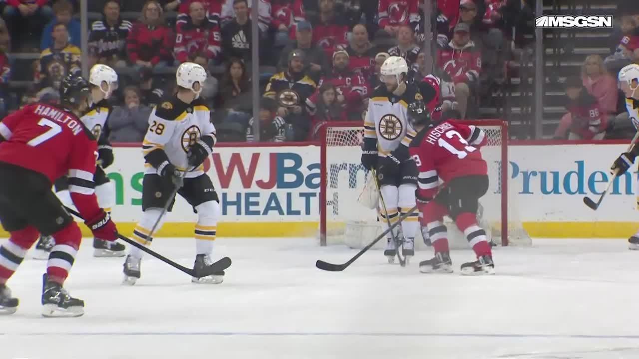 Nico Hischier scores a goal against the Boston Bruins