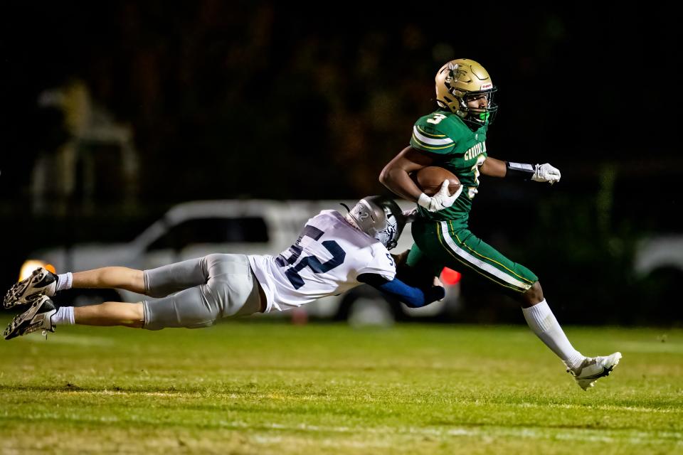 Savannah Country Day's Michael Grandy breaks a tackle on a kick return against Stratford Academy on Sept. 24, 2021 at Saunders Field.