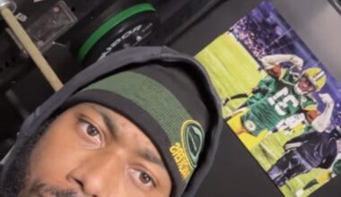 Former Green Bay Packers safety Adrian Amos posted an Instagram story wearing a Packers hat with a picture of him in a Packers uniform in the background.