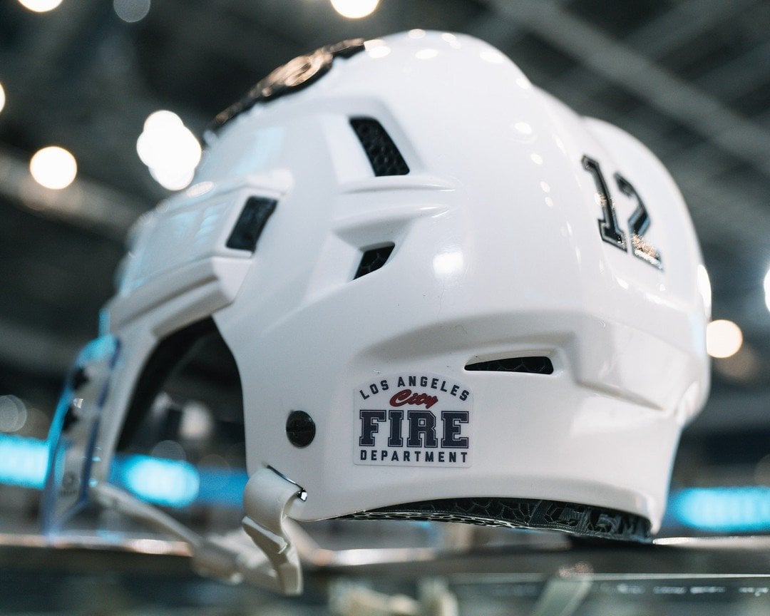 Jets and Kings Honor LAFD Firefighters with a Helmet stick via @laking on Threads