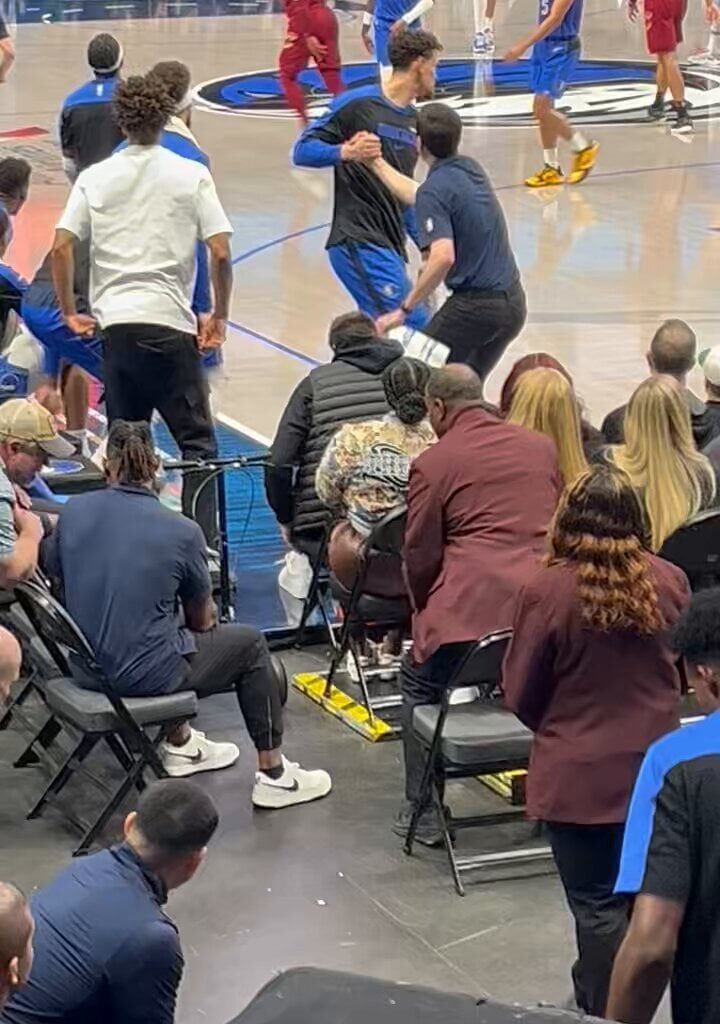 Luka scooting away in some sort of weird bicycle after the game with the cavs