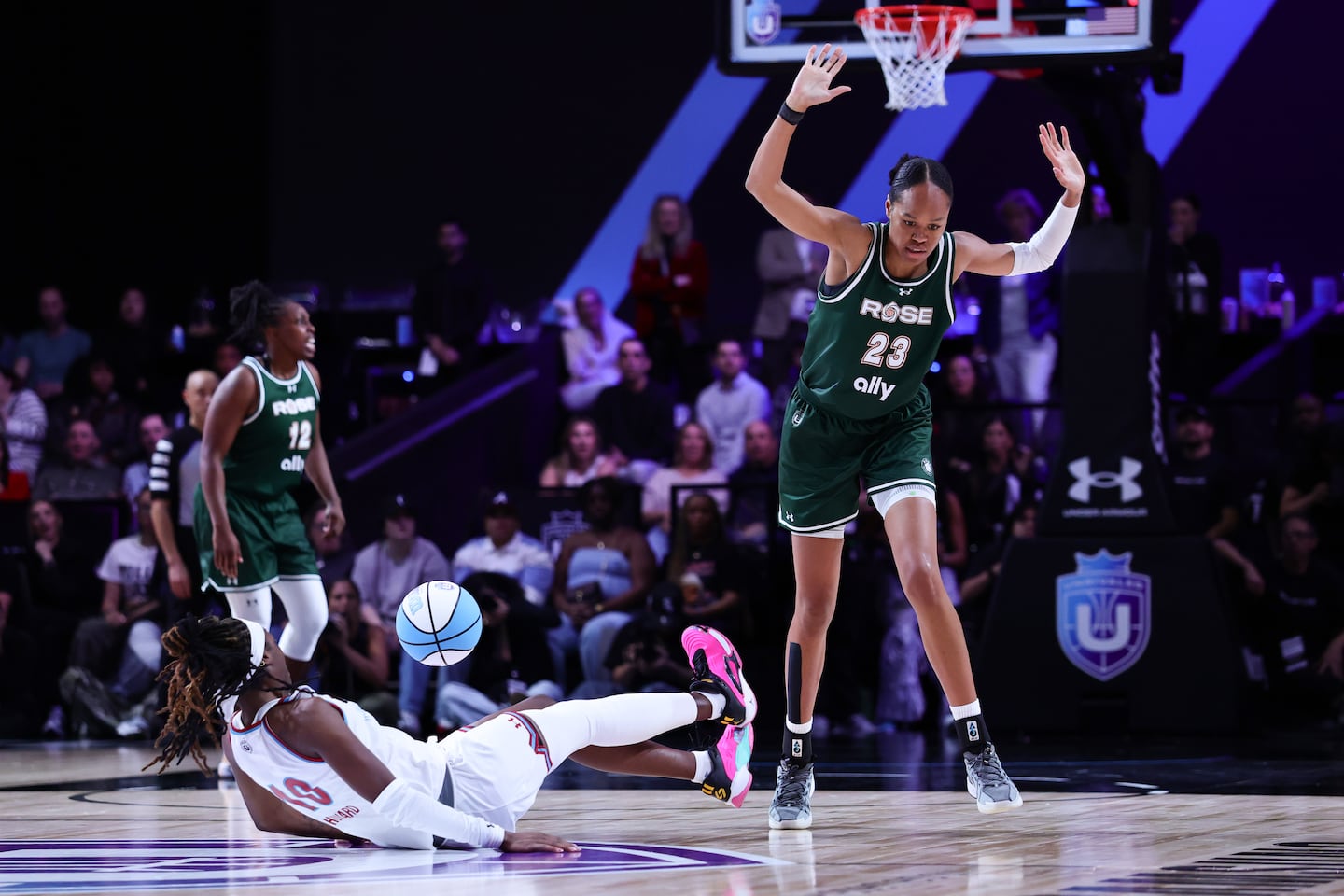 Rose's Azurá Stevens (right) collided with Rhyne Howard of the Vinyl during Unrivaled play on Jan. 17 in Medley, Fla.