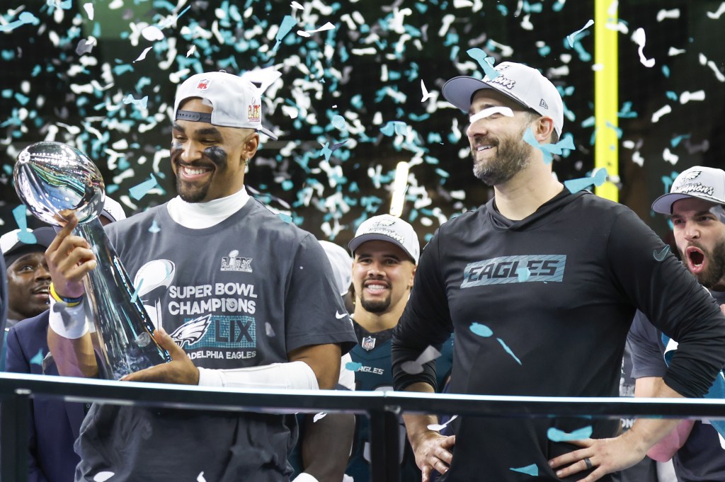 Jalen Hurts holds the Vince Lombardi trophy after the Eagles won Super Bowl 2025.