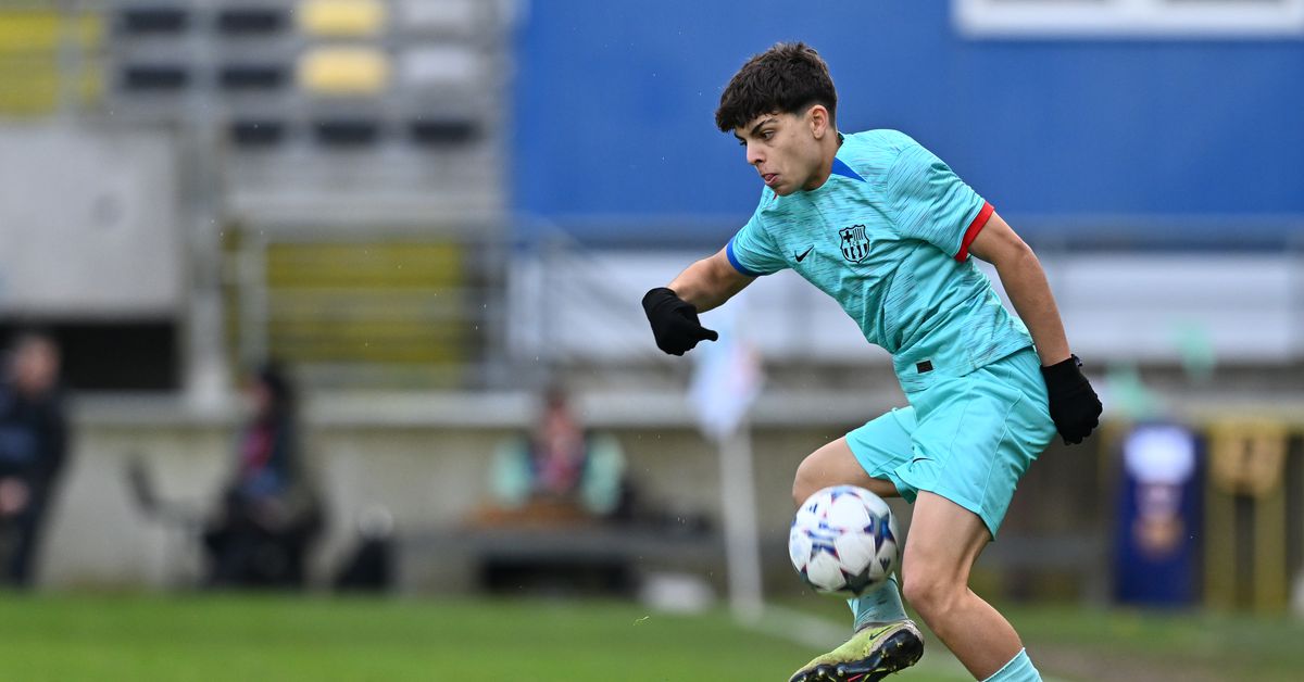 Hansi Flick takes a check on Barcelona teen Xavi Espart in training