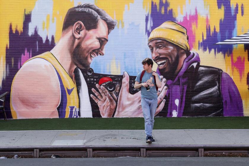 Kobe Bryant greets Laker Luka Doncic in new L.A. mural based off 2019 meeting at game