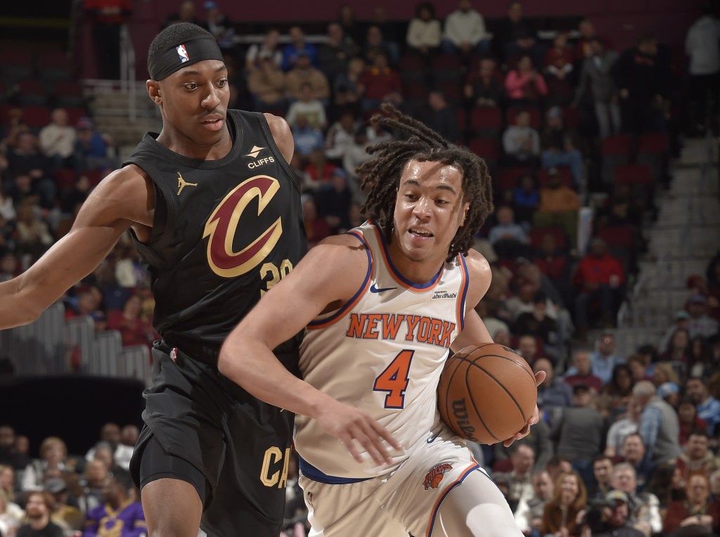 Pacome Dadiet drives to the basket during the Knicks' blowout loss to the Cavaliers on Feb. 21, 2025.