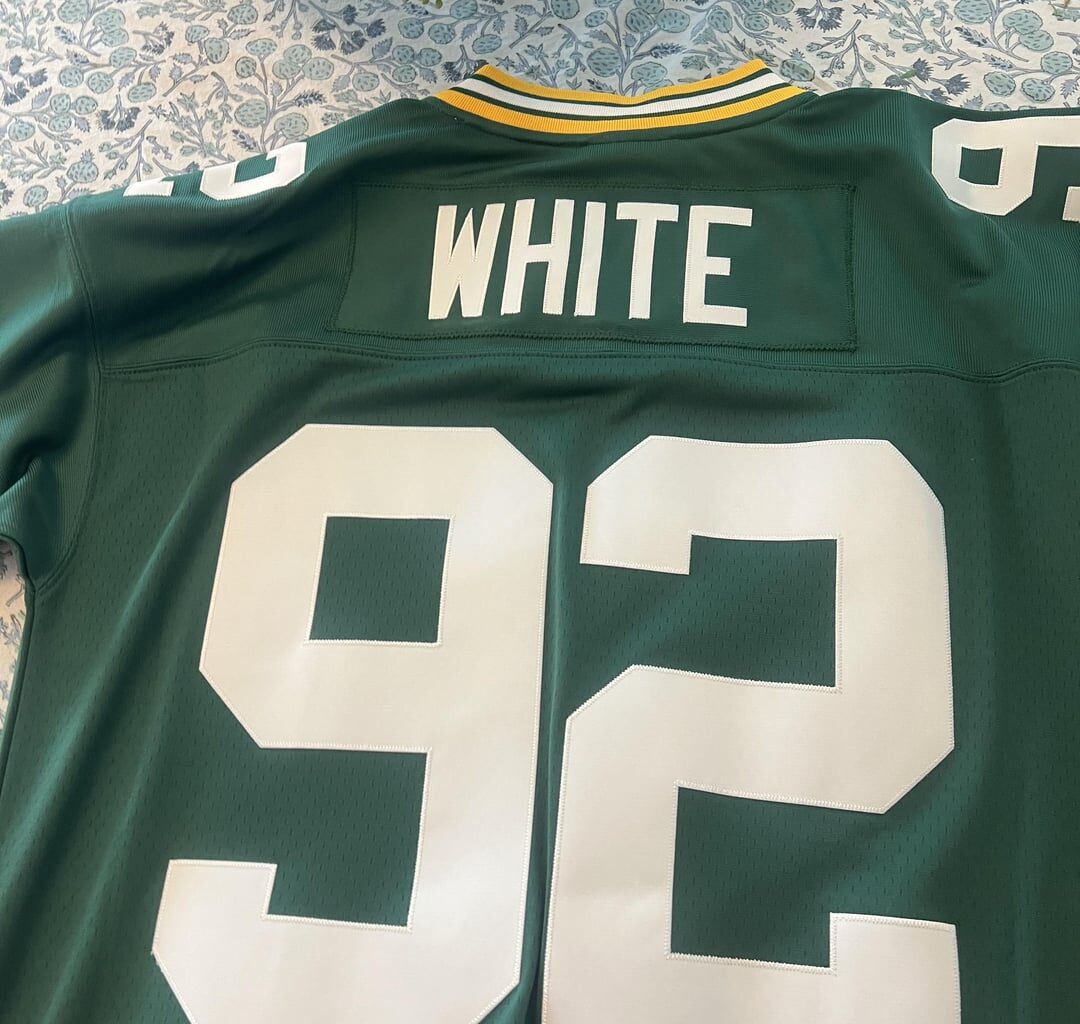 Down sizing; jersey give away (Reggie White)