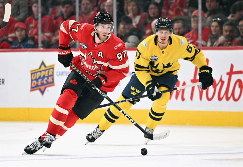 Connor McDavid #97 of Team Canada skates against Team Sweden in the NHL 4 Nations Face-Off at Bell Centre on February 12, 2025 in Montreal, Quebec, Canada.