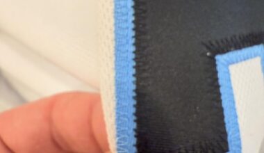 Stitching on “A” on Keller Jersey.