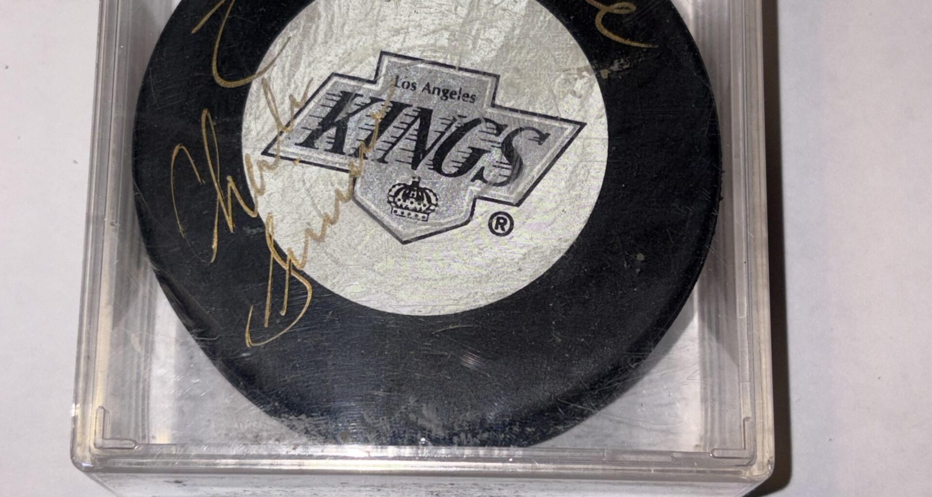Can anyone help me Identify the Signature on this puck?