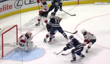 Mathieu Olivier scores a goal against the New Jersey Devils