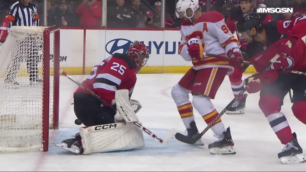 Connor Zary scores a goal against the New Jersey Devils