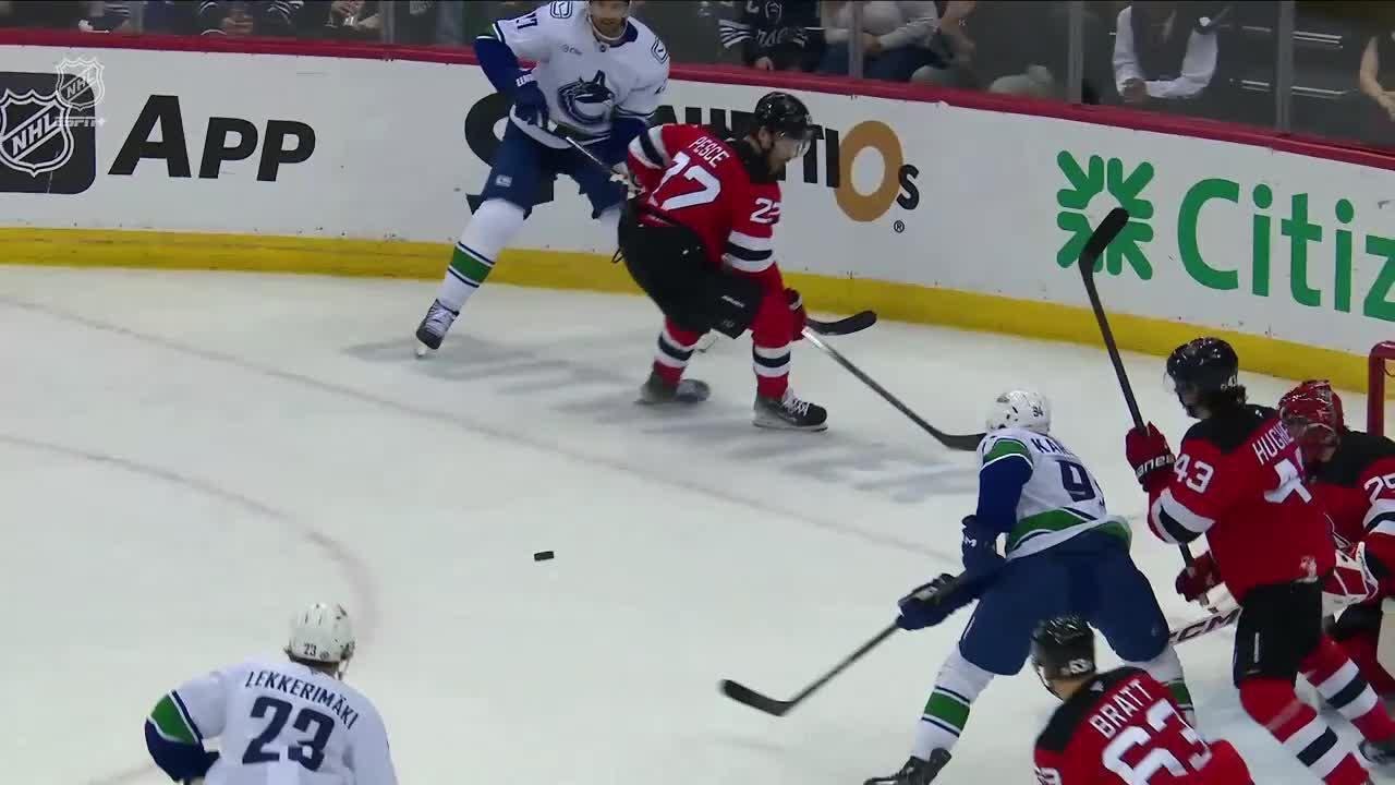 Jonathan Lekkerimaki scores a goal against the New Jersey Devils