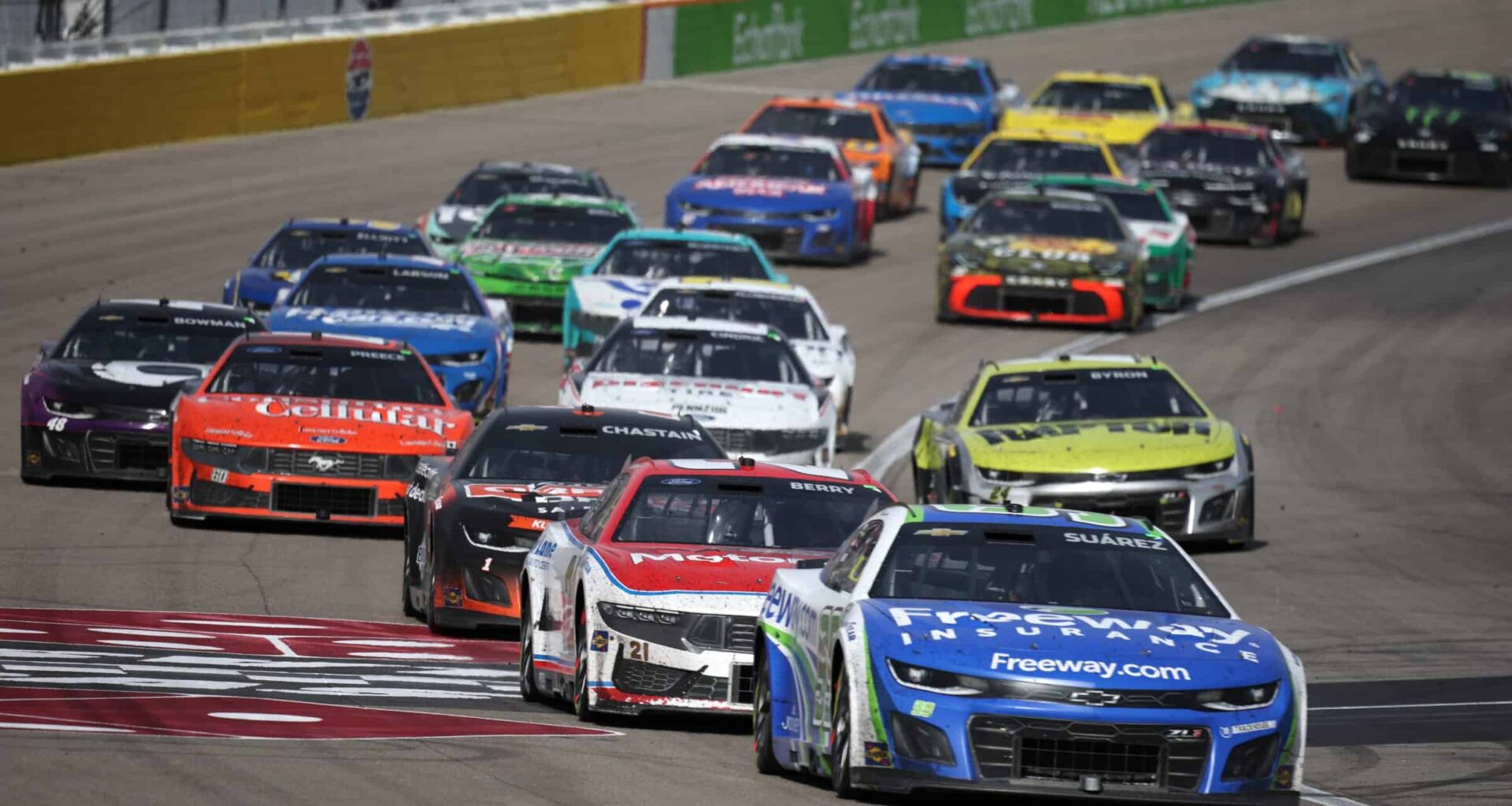 Daniel Suarez, driver of the #99 Freeway Insurance Chevrolet, leads Josh Berry, driver of the #21 Motorcraft/Quick Lane Ford, during the NASCAR Cup Series Pennzoil 400 at Las Vegas Motor Speedway on March 16, 2025 in Las Vegas, Nevada. (Photo by Chris Graythen/Getty Images)