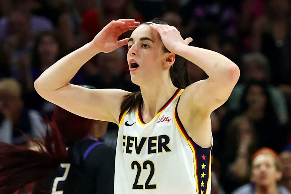 Indiana Fever guard Caitlin Clark (22) reacts to a play during the second half of the game against the Phoenix Mercury.Mark J&period; Rebilas-Imagn Images