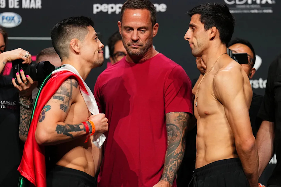 MEXICO CITY, MEXICO - MARCH 28: (L-R) Opponents Brandon Moreno of Mexico and Steve Erceg of Australia face off during the UFC Fight Night ceremonial weigh-in at CDMX Arena on March 28, 2025 in Mexico City, Mexico. (Photo by Chris Unger/Zuffa LLC)
