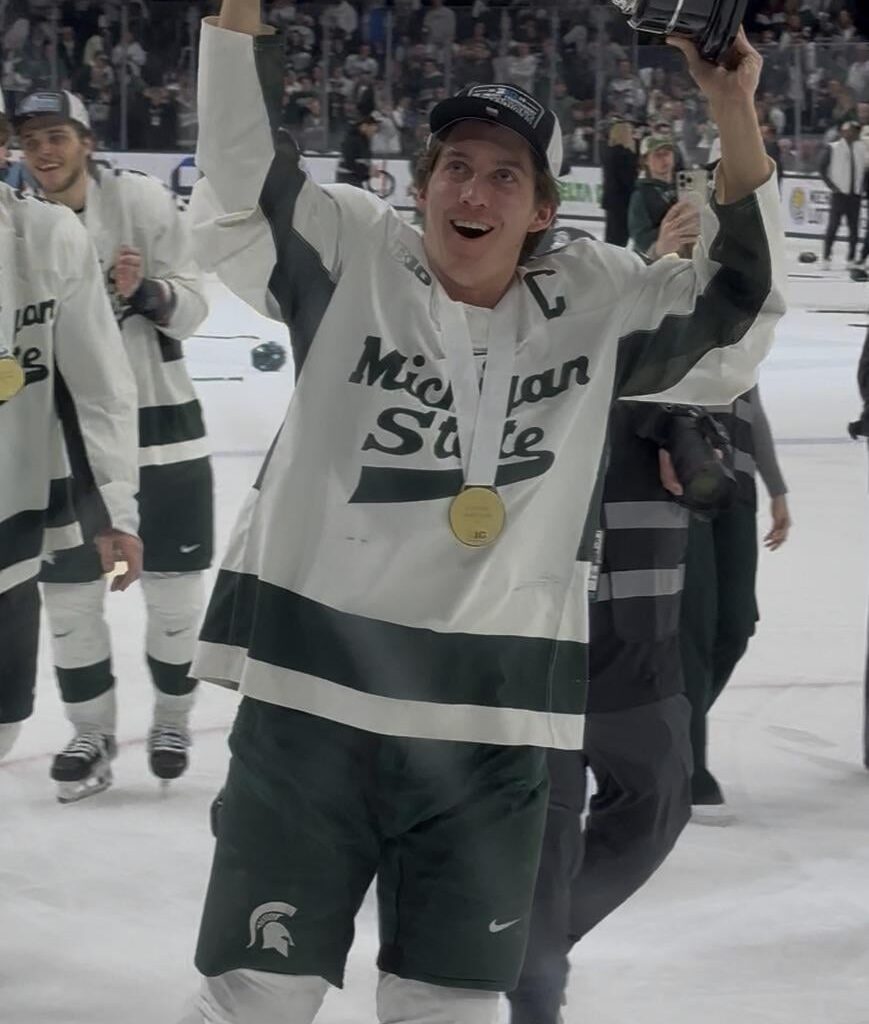 A shot I took of Red Savage wheeling the Big Ten tournament trophy around tonight