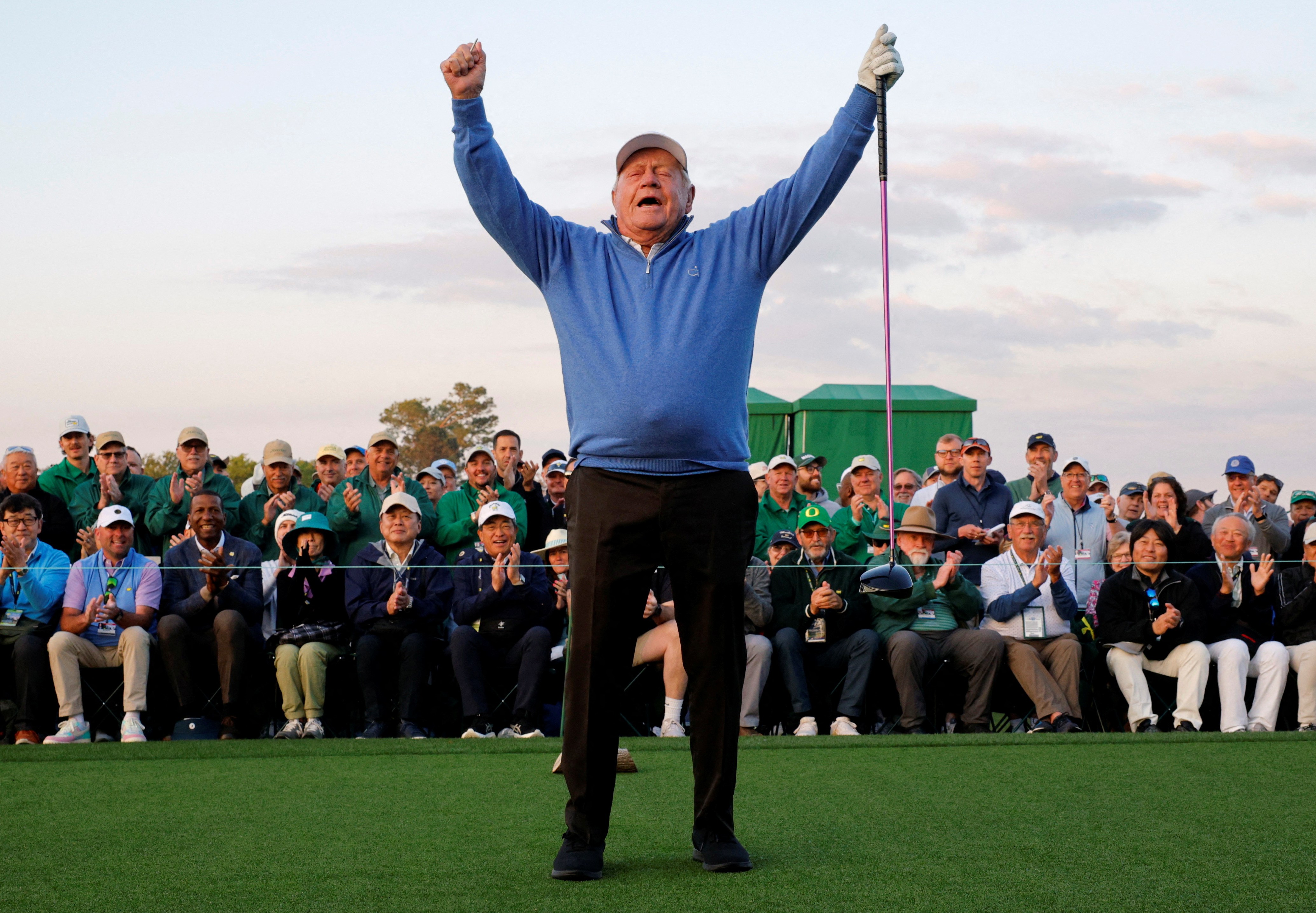 Nicklaus, 85, celebrates after hitting his tee shot in the Honorary Starters Ceremony