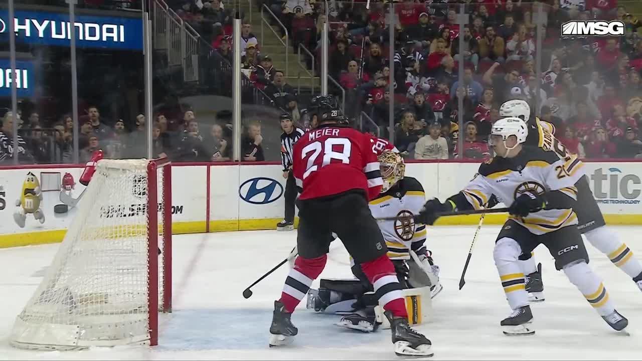 Timo Meier scores a goal against the Boston Bruins