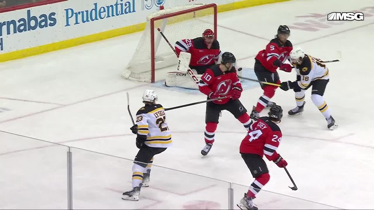 Casey Mittelstadt scores a goal against the New Jersey Devils