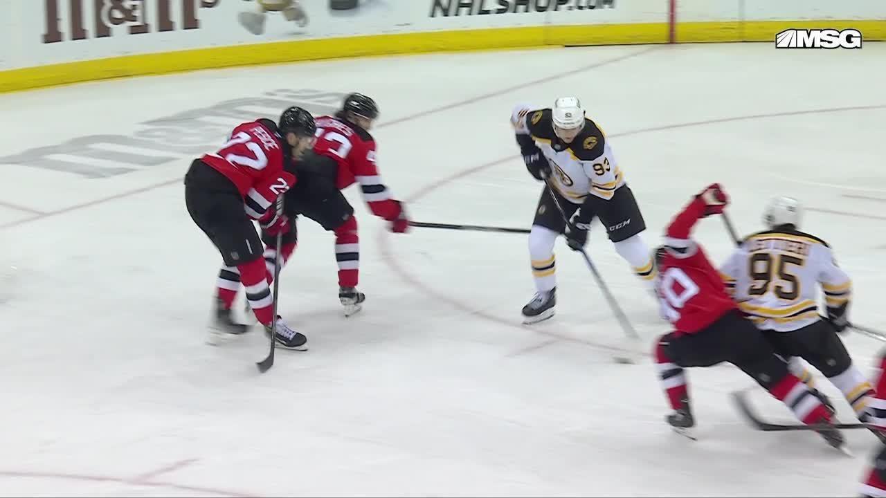 Fraser Minten scores a goal against the New Jersey Devils