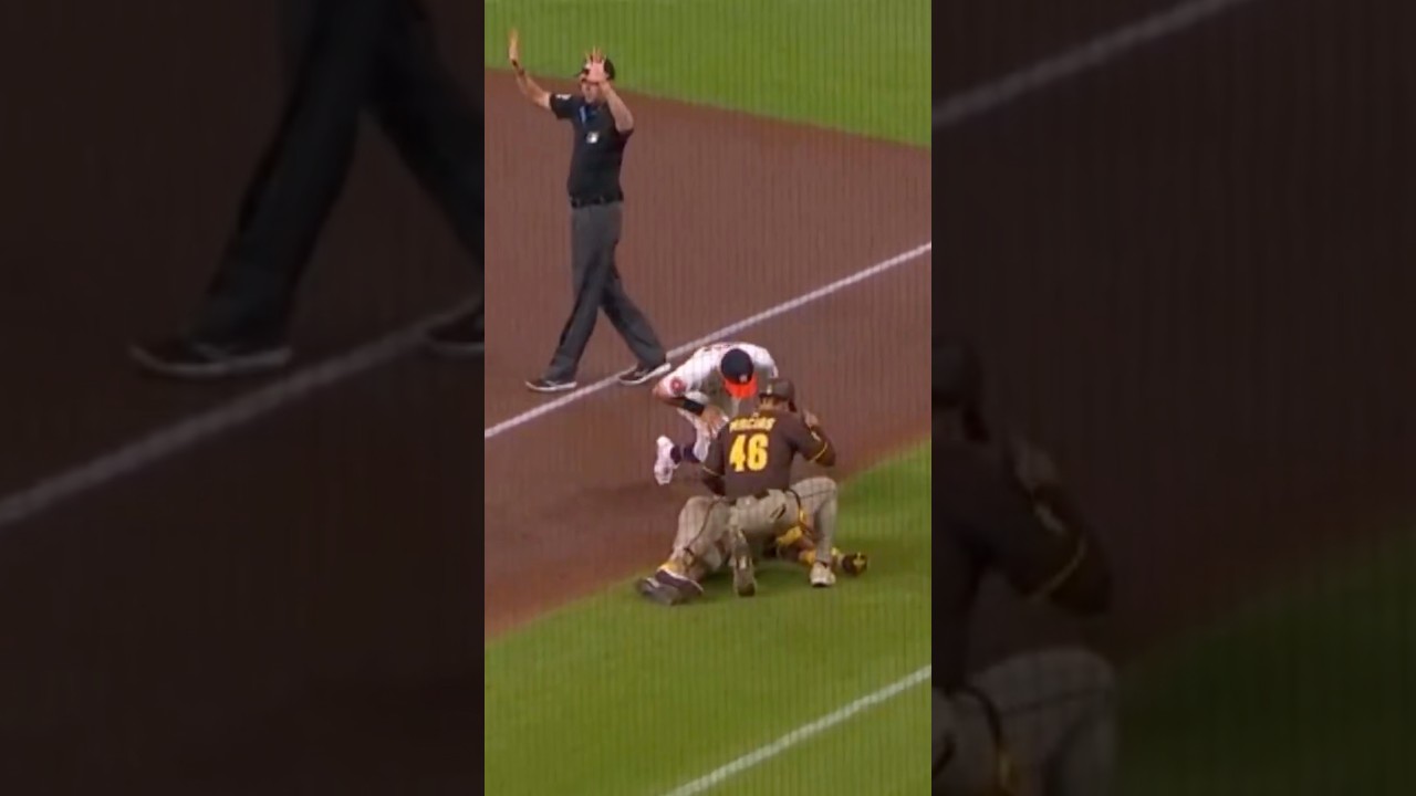 Luis Arraez CARTED OFF after a collision at first base!
