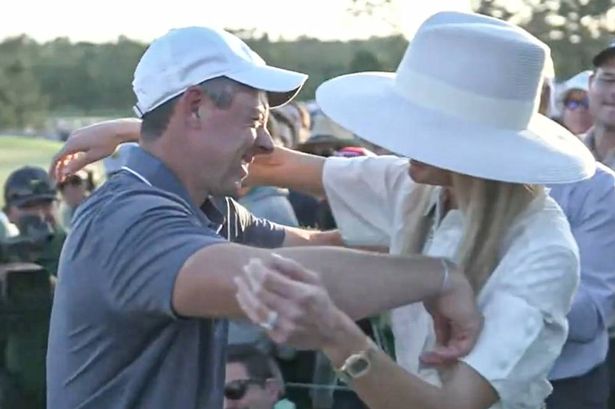 A tearful Rory McIlroy with his wife moments after victory at the Masters