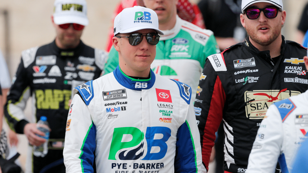 Mar 2, 2025; Austin, Texas, USA; NASCAR Cup Series driver John Hunter Nemechek (42) walks out onto the stage for driver introductions before the EchoPark Automotive Grand Prix at Circuit of the Americas. Mandatory Credit: Jamie Harms-Imagn Images