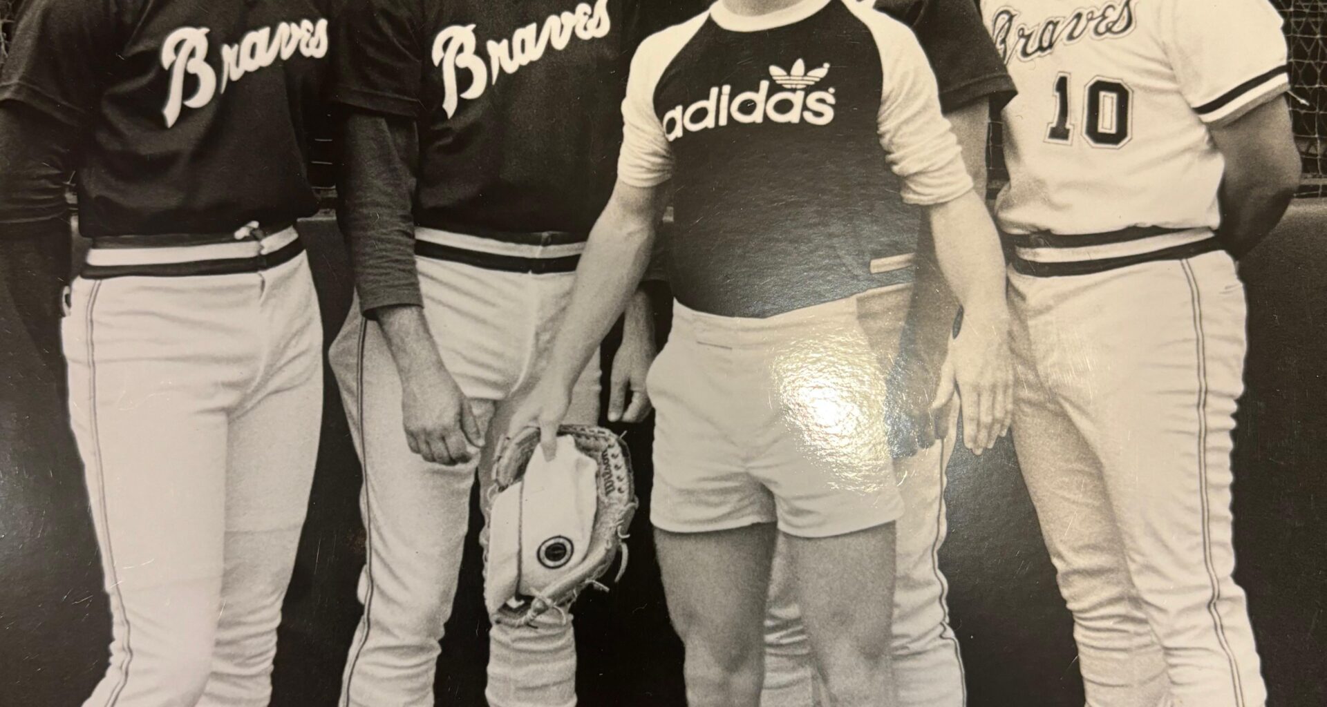 Found a picture of my dad with some Braves players in what must have been the mid 80s. Looks like Chris Chambliss, Bruce Benedict(?), Rick Mahler(?), and not sure who on the far left.
