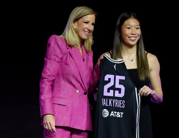 (R-L) Kaitlyn Chen poses for a photo with WNBA Commissioner Cathy Engelbert after being selected with the 30th pick in the third round by the Golden State Valkyries during the 2025 WNBA Draft at The Shed on April 14, 2025 in New York City. NOTE TO USER: User expressly acknowledges and agrees that, by downloading and or using this photograph, User is consenting to the terms and conditions of the Getty Images License Agreement. (Photo by Elsa/Getty Images)