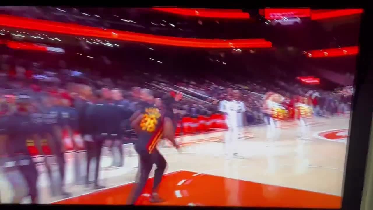 Full video of the Hawks fan tearing his ACL during the tic-tac-toe halftime game. His opponent continues playing for the win while James writhes in agony. The announcer tries to ask him to "Be kind" and check on James.