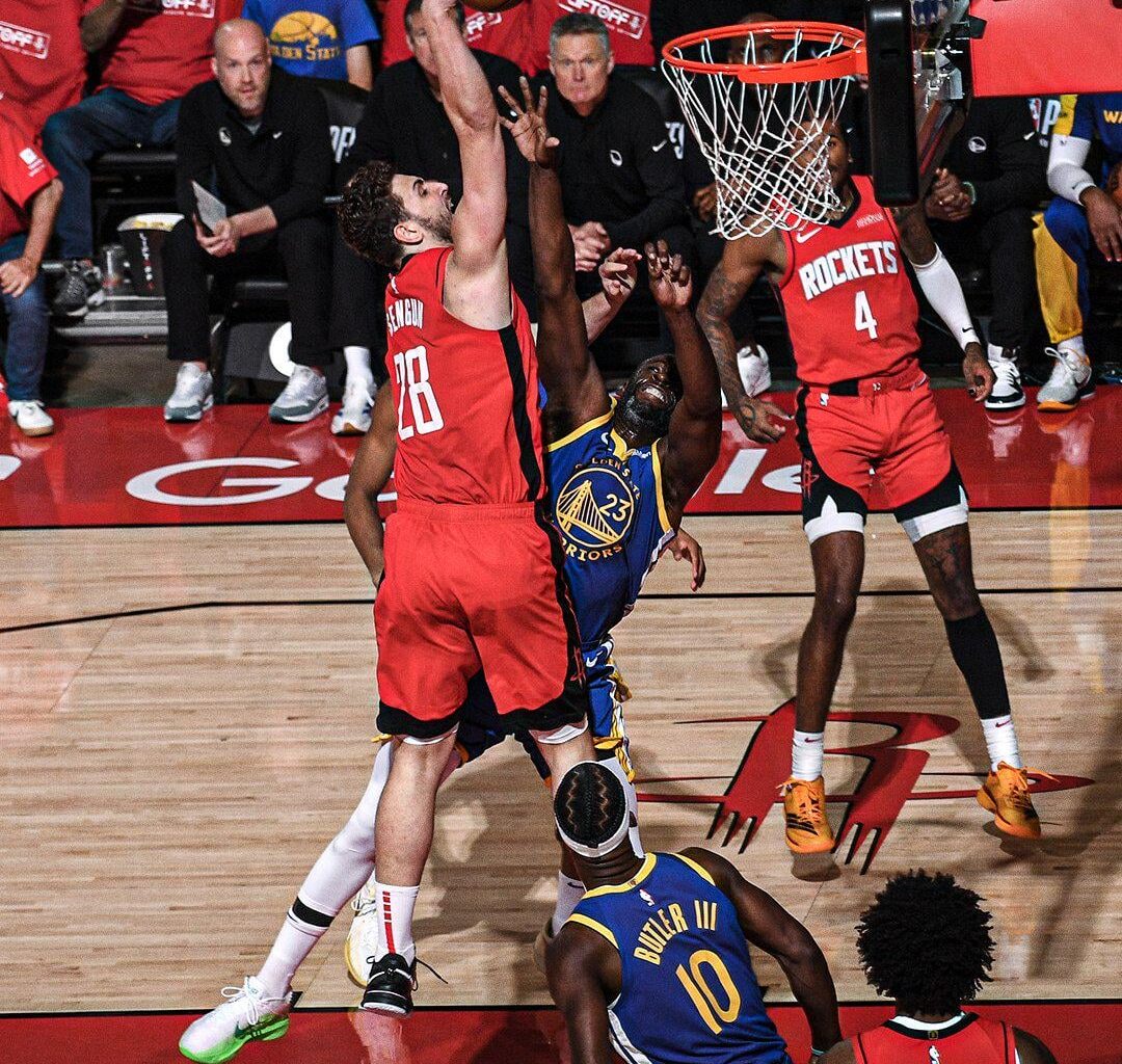 AIpi on Draymond. I have seen the alternative angle photo but this one is great, too.