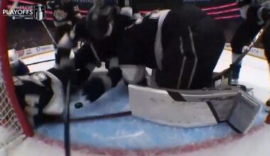 Byfield covering the puck with 2 hands in the blue paint. No call