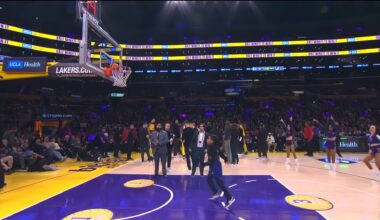 [Highlight] LeBron comes out of nowhere to help un-wedge a poor kid's ball