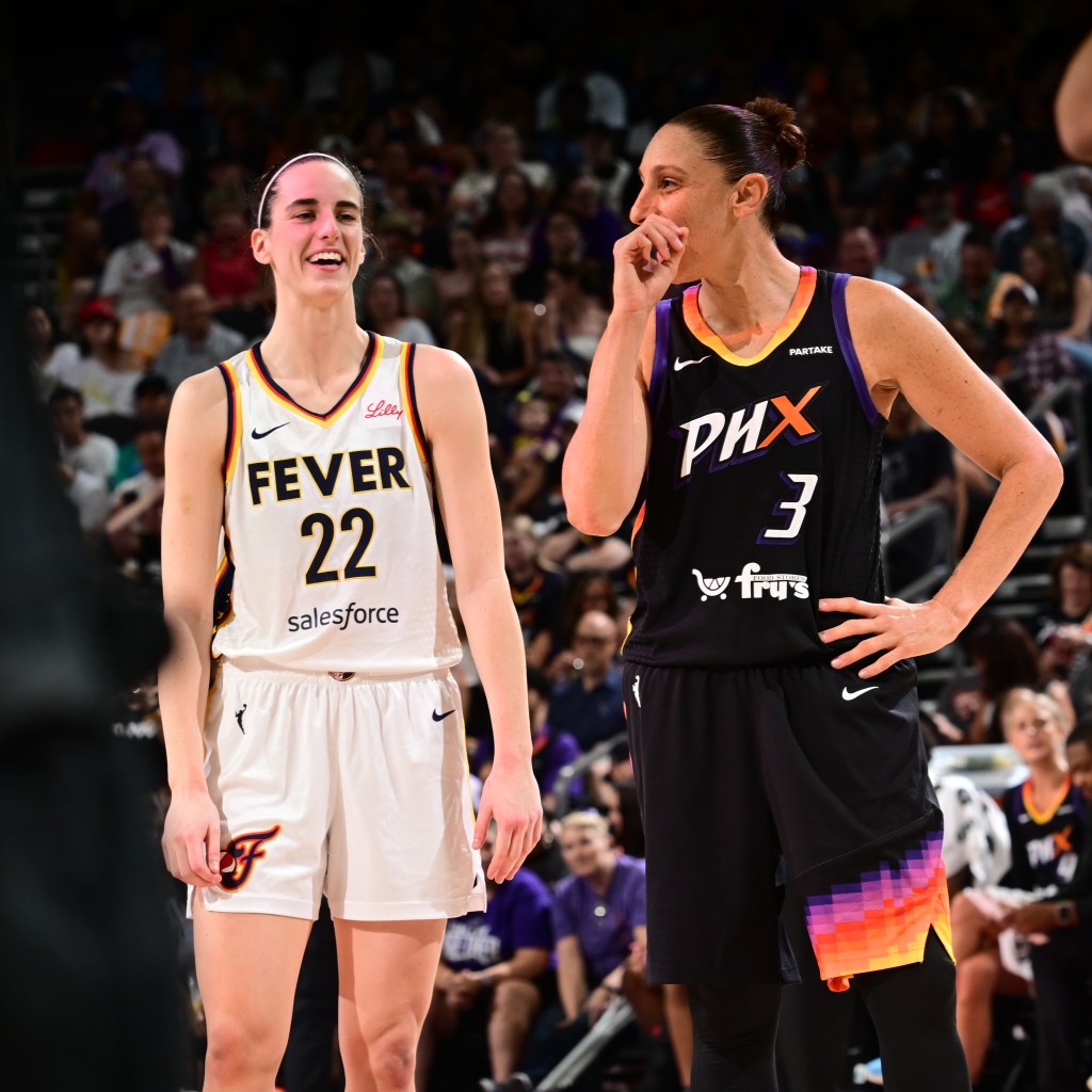 Caitlin Clark and Diana Taurasi talk during a matchup this past season.