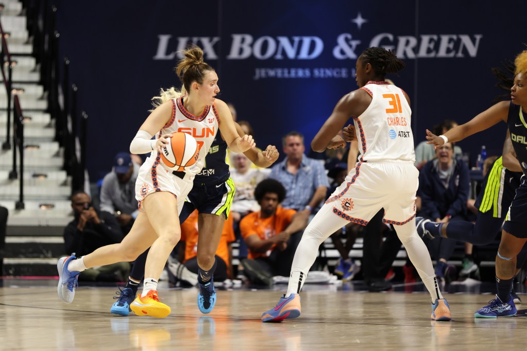 Marina Mabrey #3 of the Connecticut Sun drives to the basket during the game against the Dallas Wings on May 27, 2025 at the Mohegan Sun Arena in Uncasville, Connecticut.