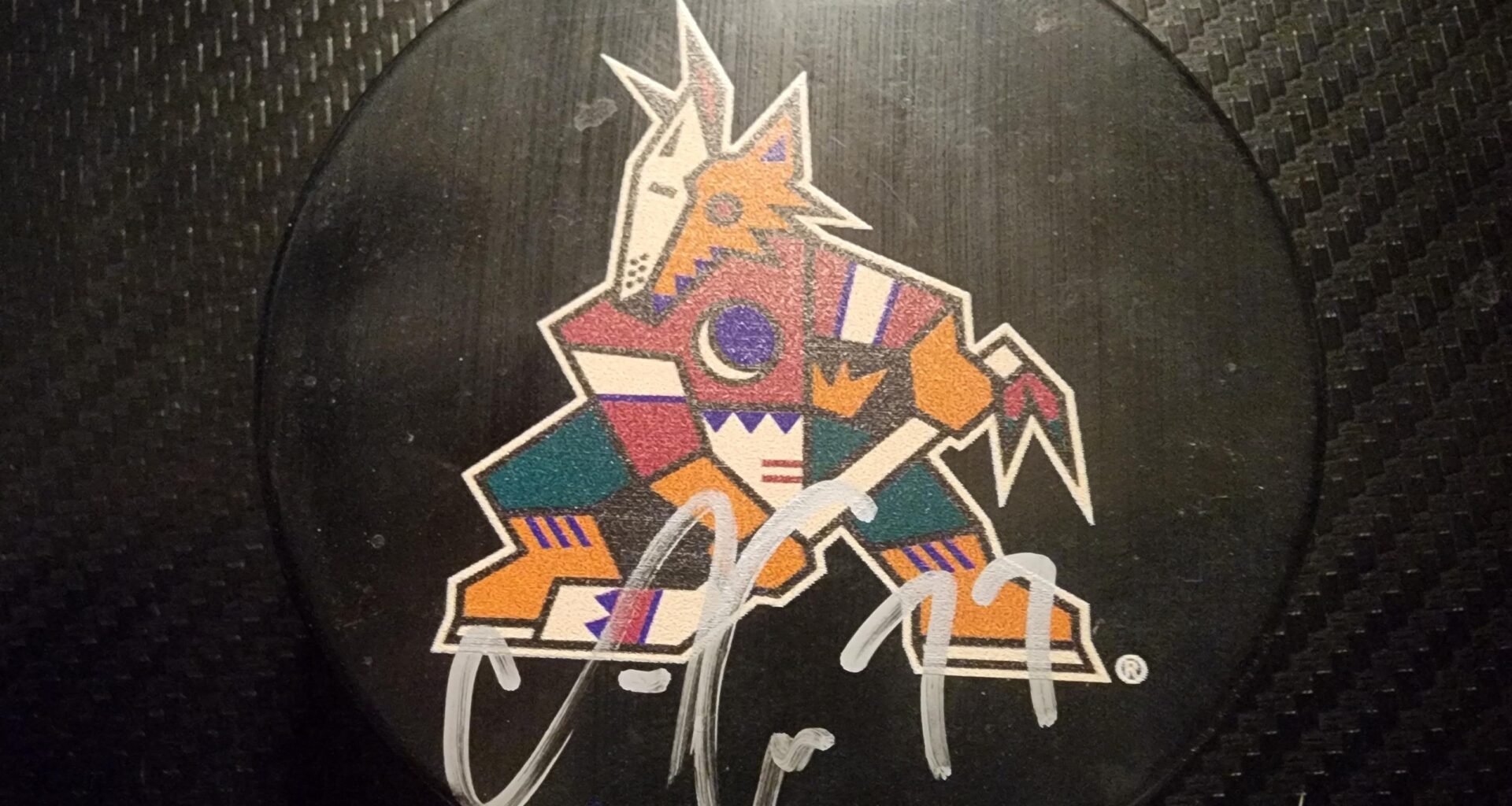 Signature identification. I was gifted this puck.