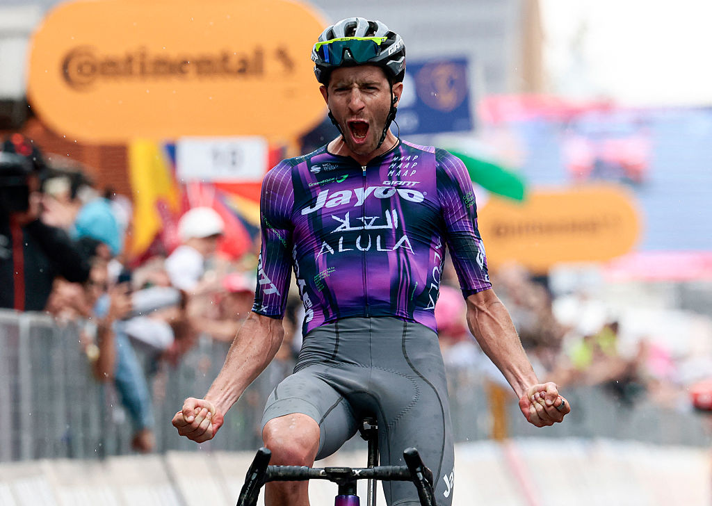 Team Jayco AlUla's Australian rider Chris Harper celebrates as he crosses the finish line to win the 20th stage of the 108th Giro d'Italia cycling race 205kms from Verres to Sestriere on May 31, 2025. (Photo by Luca Bettini / AFP)
