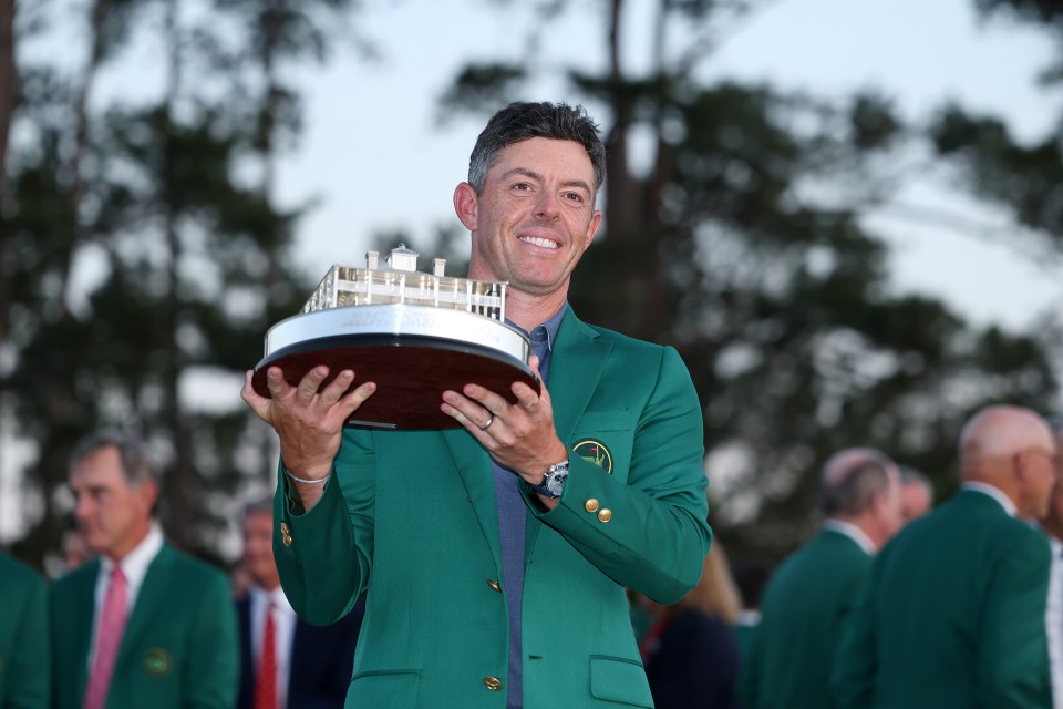 AUGUSTA, GEORGIA - APRIL 13: Rory McIlroy of Northern Ireland poses with the Masters trophy during the Green Jacket Ceremony after winning the 2025 Masters Tournament at Augusta National Golf Club on April 13, 2025 in Augusta, Georgia. (Photo by Richard Heathcote/Getty Images)