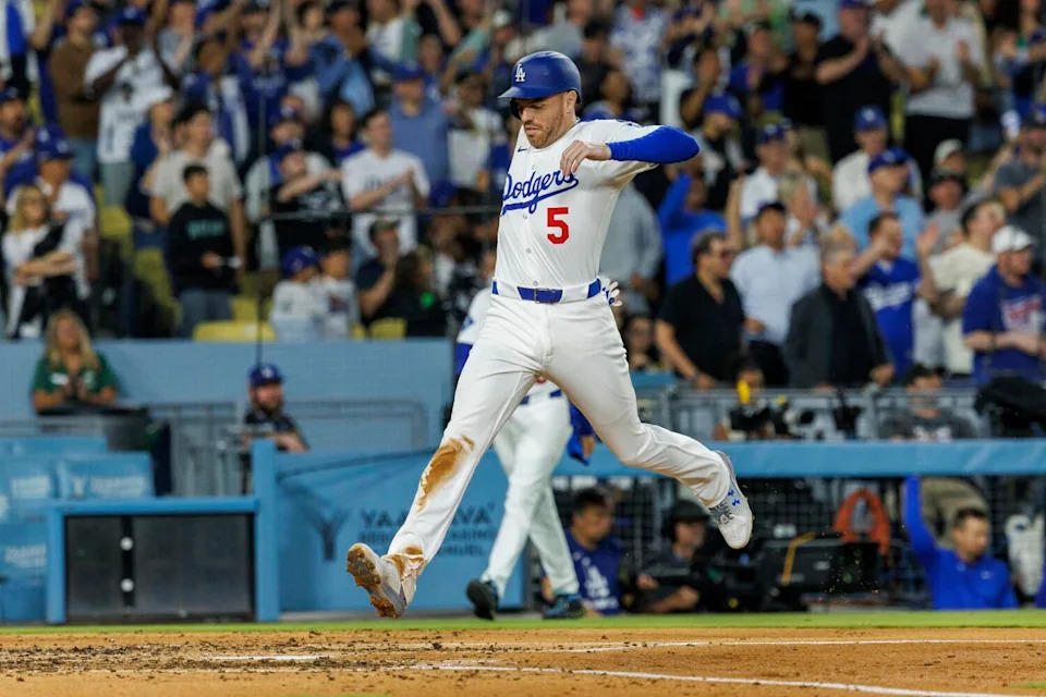 Freddie Freeman scores on a double by Will Smith in the fourth inning