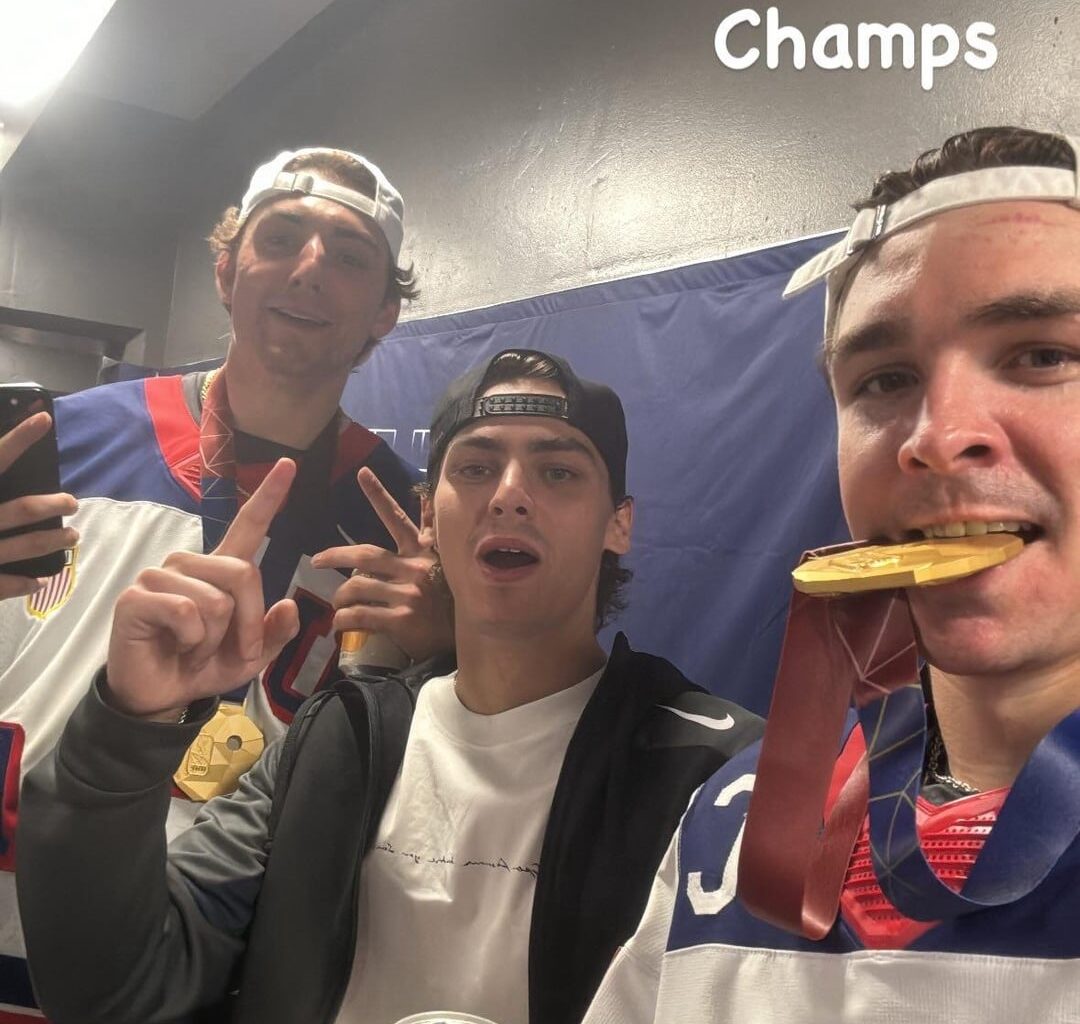 Locker room photos of the boys after winning gold