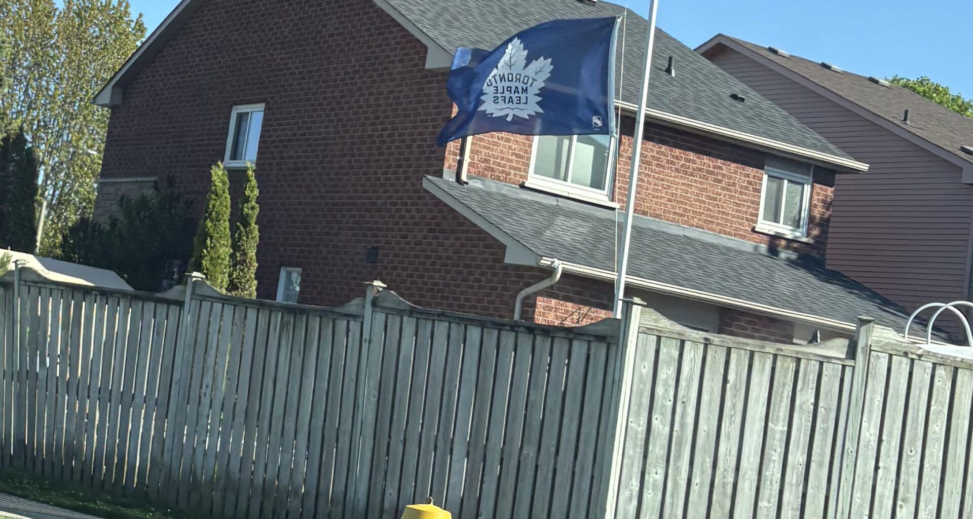 Neighbour's flag is at half-mast til further notice